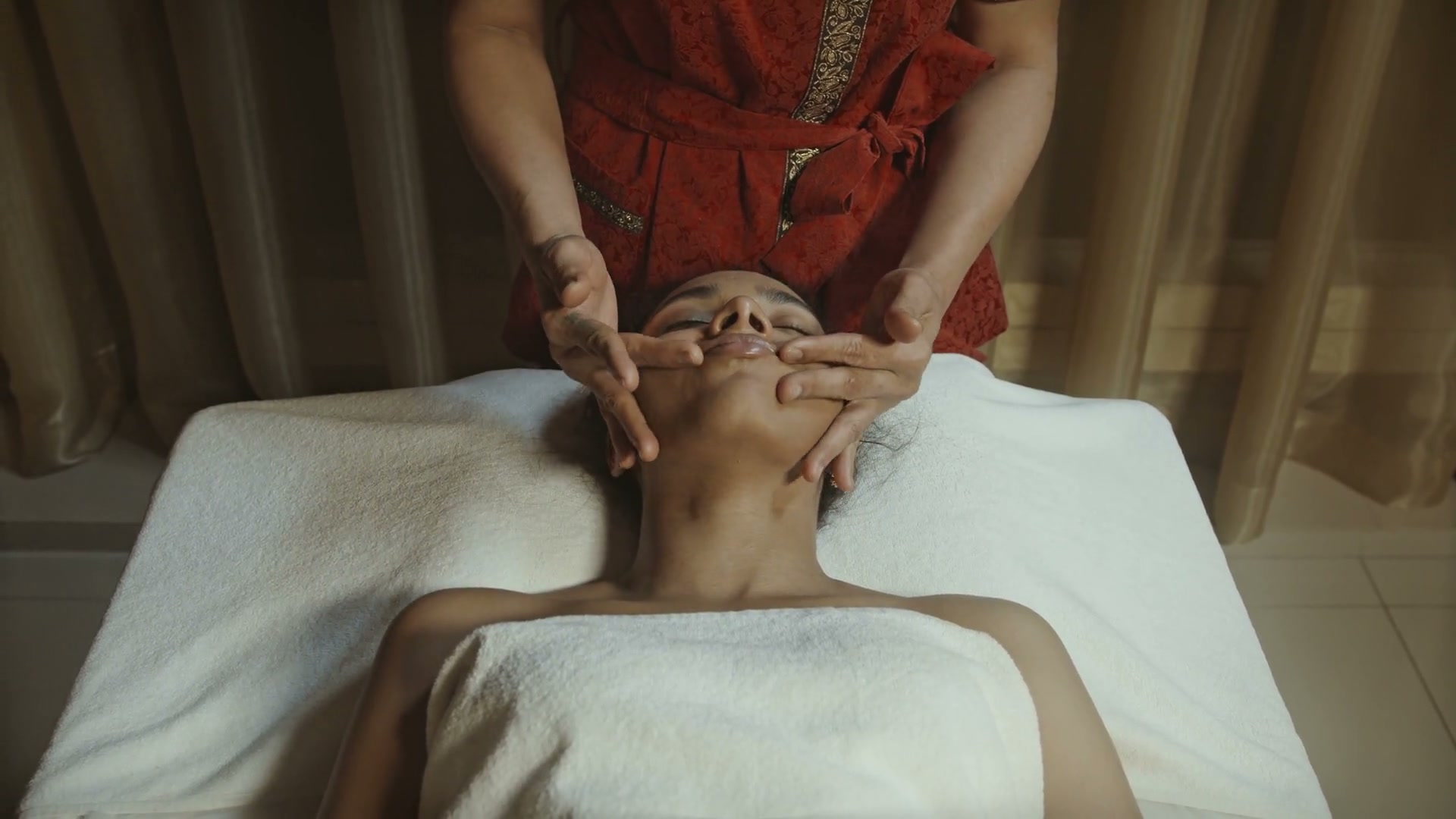 Thai Grace Massage & Wellbeing hero — full designed hero with looping video background, headline, and primary booking actions